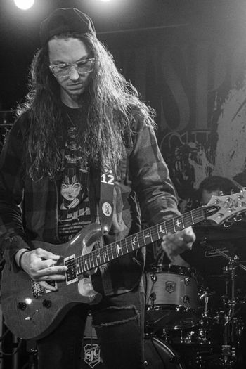 Stacey Hopkins, Guitar.
