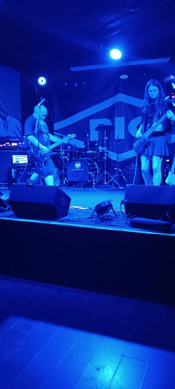 That time I opened for PIG at Lefty's in Des Moines. Kai Corey on bass here. Photo by Bethany Connor.
