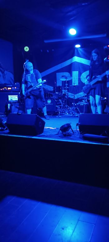 That time I opened for PIG at Lefty's in Des Moines. Kai Corey on bass here. Photo by Bethany Connor.
