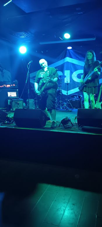 That time I opened for PIG at Lefty's in Des Moines. Kai Corey on bass here. Photo by Bethany Connor.

