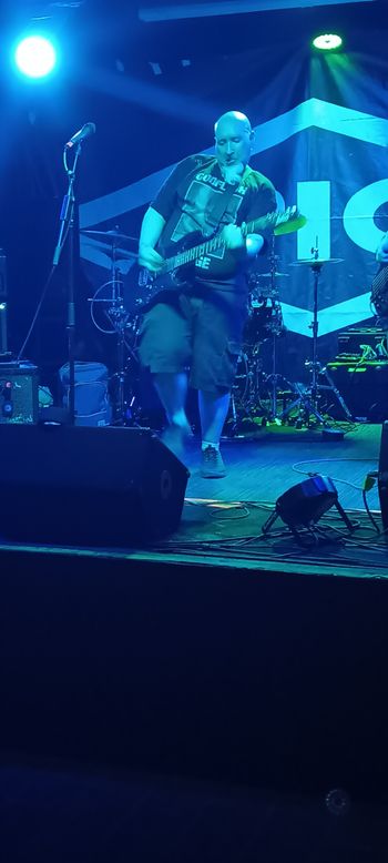 That time I opened for PIG at Lefty's in Des Moines. Kai Corey on bass here. Photo by Bethany Connor.
