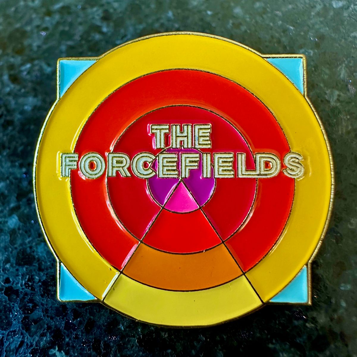 The Forcefields Enamel Pin