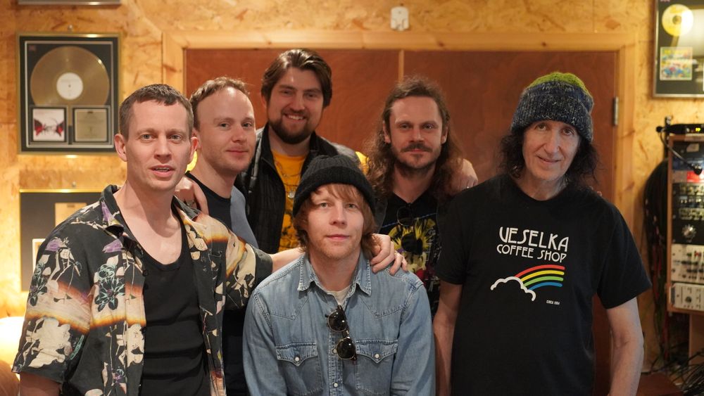 A photo of Gordon Raphael with The Strokes tribute band New York City Cops