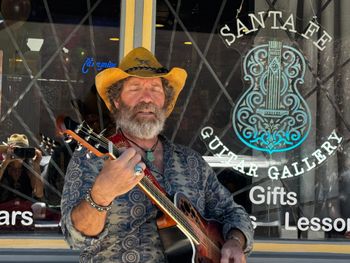 PLAYING AT THE GRAND OPENING OF THE SANTA FE GUITAR GALLERY
