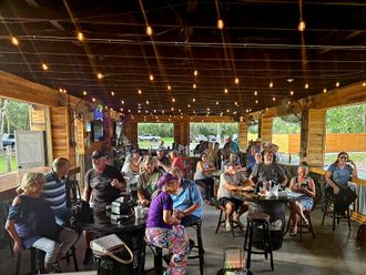 Never 2 Late at Huck's Oyster Bar, Tavern and Grill in Crystal River, FL