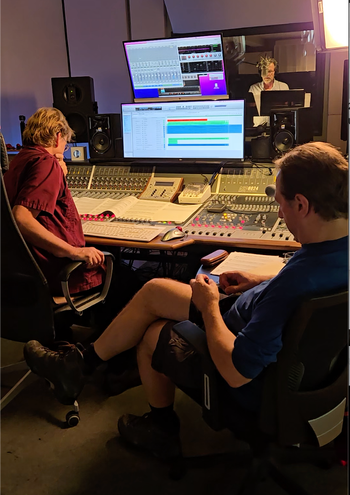 Hans Christian, Steve Koehler (in booth), Doc Heide
