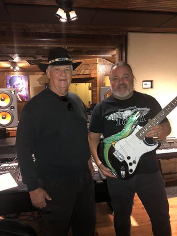 Bart Mitcham gifting Donny with a Custom Engraved Dragon Guitar

