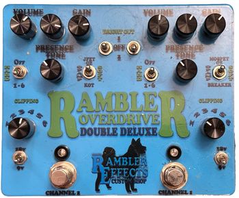 Rambler Overdrive Double Deluxe - Custom Shop

The Rambler Overdrive Double Deluxe combines two Deluxe version into a single unit, each boasting its own dedicated 9/18v power converter, and dedicated input and output jacks to maintain autonomy and flexibility within your setup.
