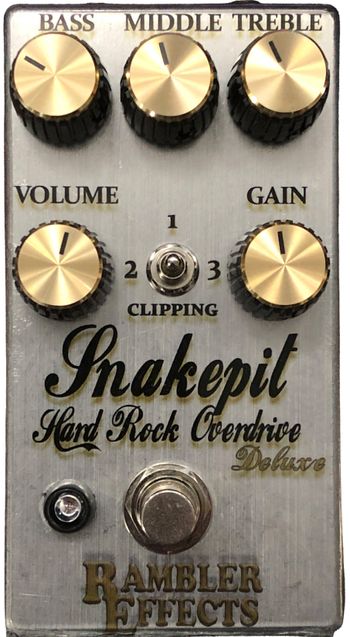 Snakepit Deluxe Hard Rock Overdrive

The Snakepit Hard Rock Overdrive is inspired by the Marshall JCM800™ & Silver Jubilee™ amplifiers favored by Slash.  A 3-Band Baxandall Active EQ allows familiar amp-like control over the tone. Turning the Drive full-up yields an aggressive distortion tone that is expected from turning up to 11. With the Drive control down classic rock and blues tones are also available.  Deluxe Version adds 2 additional clipping options.
