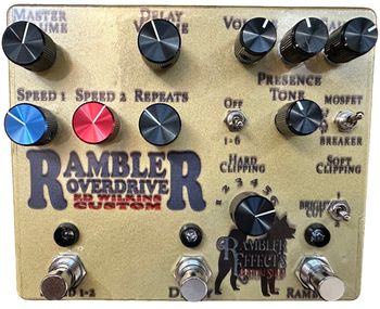 Rambler Overdrive Ed Wilkins Custom

This custom pedal combines a Rambler Overdrive Deluxe with a Two-Time Delay. It offers a warm, articulate overdrive with a touch of vintage character, complemented by the smooth, analog delay that adds depth and dimension to the sound.
