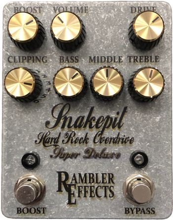Snakepit Super Deluxe Hard Rock Overdrive

The Snakepit Hard Rock Overdrive is inspired by the Marshall JCM800™ & Silver Jubilee™ amplifiers favored by Slash.  A 3-Band Baxandall Active EQ allows familiar amp-like control over the tone. Turning the Drive full-up yields an aggressive distortion tone that is expected from turning up to 11. With the Drive control down classic rock and blues tones are also available.  The Super Deluxe adds a 6 way clipping selector and a footswitchable solo boost.
