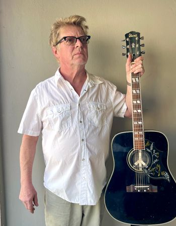 A man and his guitar
