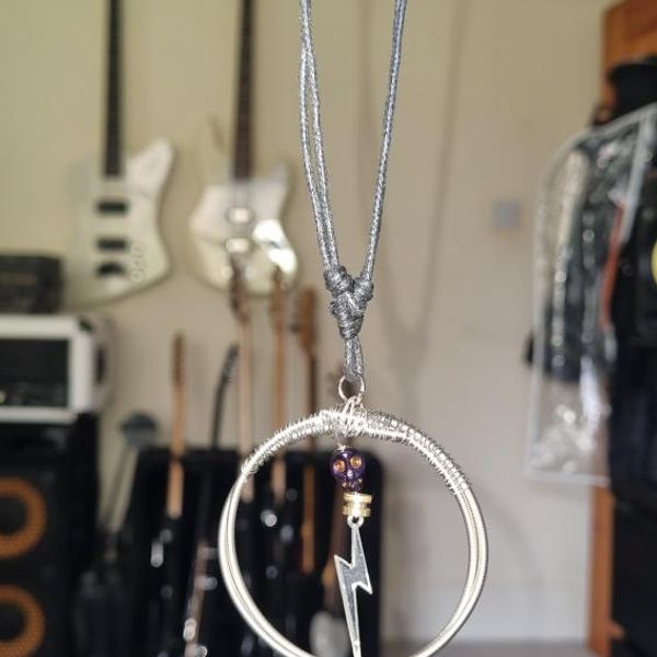 CUSTOM THUNDER SKULL BASS STRING NECKLACE