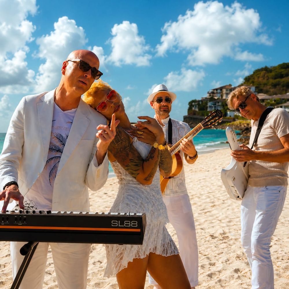 The bandmembers of Santa Claus Goes to Antigua