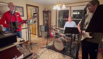Siobhan drumming at a rehearsal
