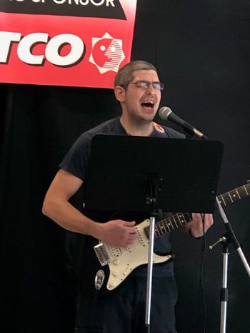 Eric singing & playing guitar
