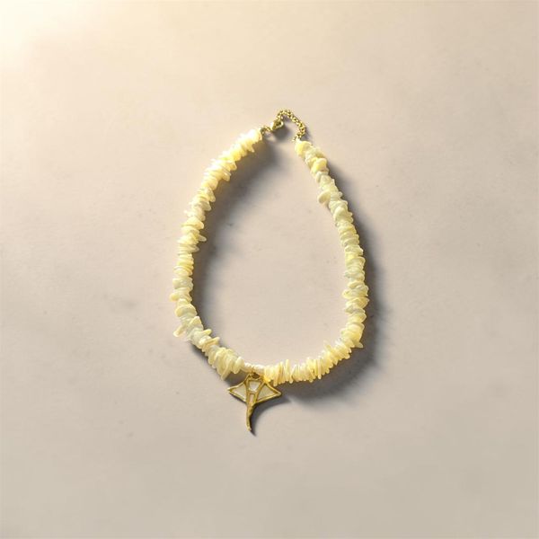 White and gold manta ray necklace 