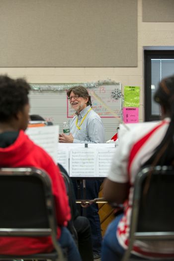 Working with a school orchestra.
