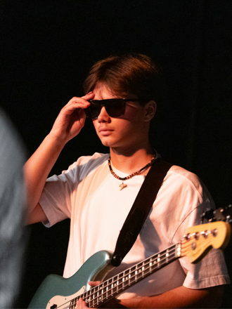 Brendan holding glasses