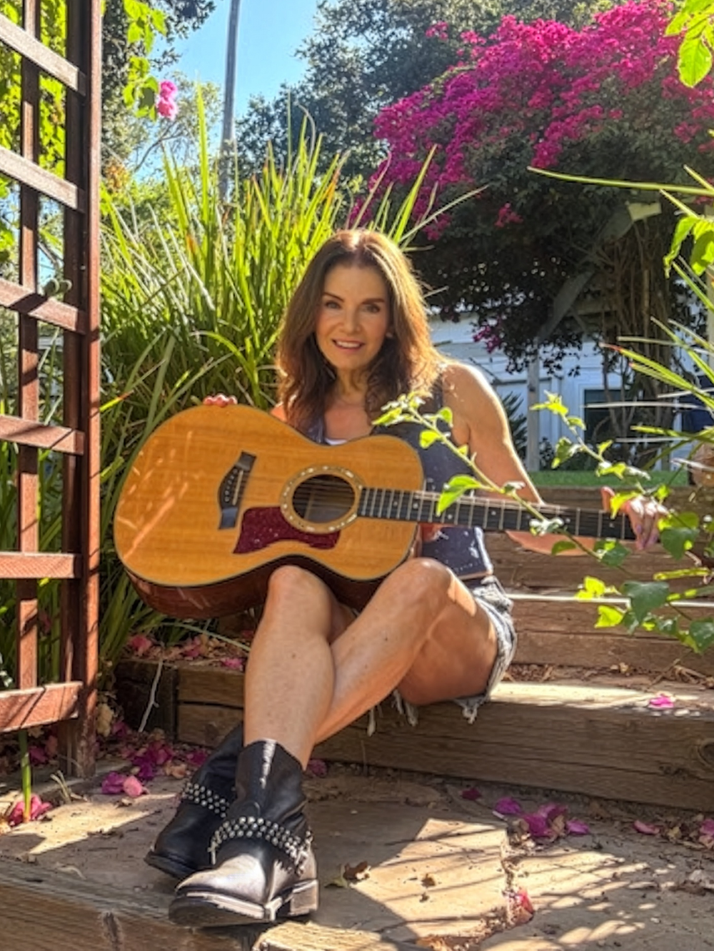 Fran Lucci with guitar