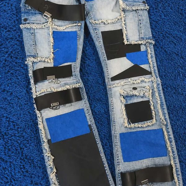stacked jeans with leather & suede patches