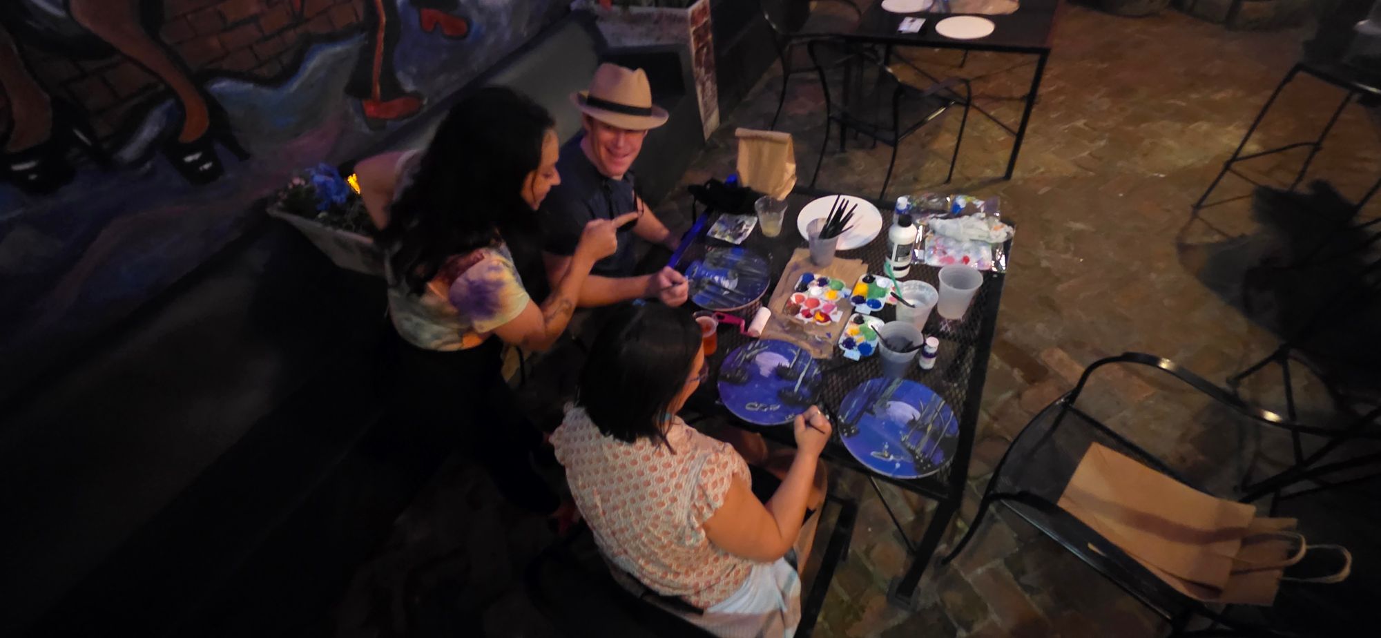 Paint and sip setup with wine and canvases
