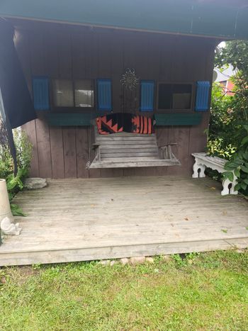 The porch swing, what a cool old vibe!
