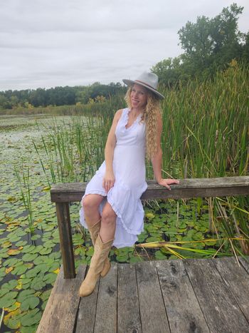Mrs. Gray perched by the lake!
