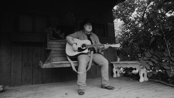Setting up for the shot of me playing the geetare, lol I actually learned how to finally play "Whippoorwill!"
