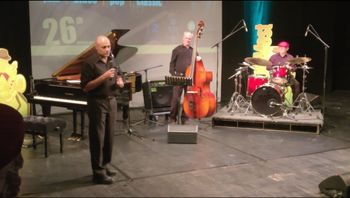 Introducing a song at a Europafest gala concert,  Bucharest, 2019

