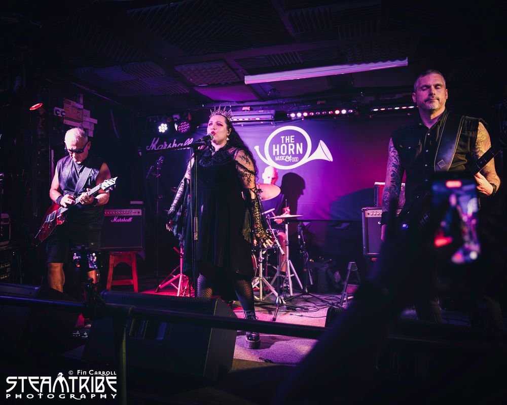Image of Scarlett Inferno playing live.