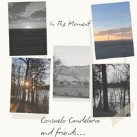 In the moment by Consuelo Candelaria