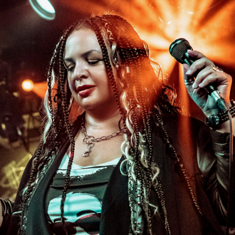 Davina Robinson, American blues singer, singing with Bluesaholic, Osaka blues band, Japan