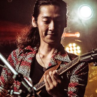 Hiroshi Shinohara playing guitar with Bluesaholic, Osaka-Kyoto blues band