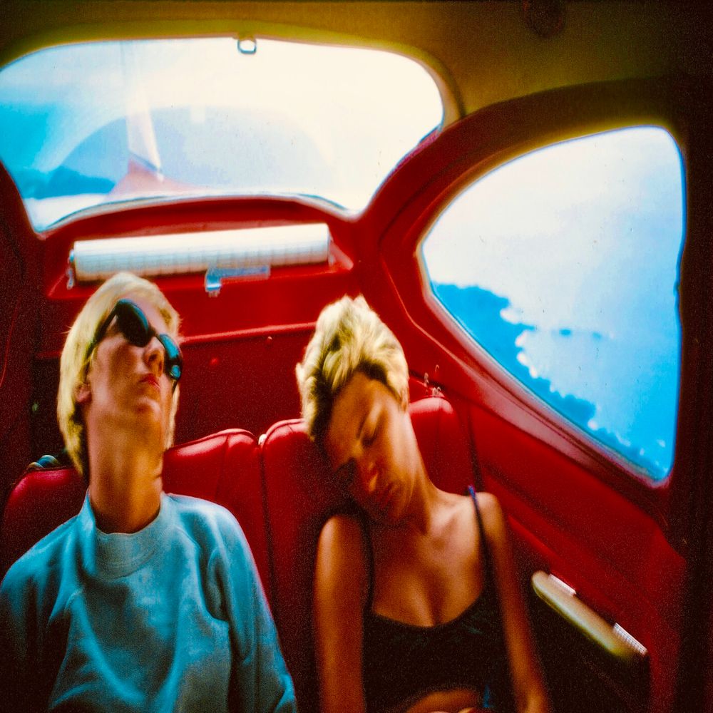 Waldrop and Sky Band indie pop song man and woman in small red airplane sleeping  photo artwork for What You Do To Me