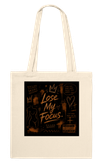 "Lose My Focus." Tote Bags.