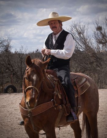 Smokey riding Rooster while shooting YouTube video The Vaquero
