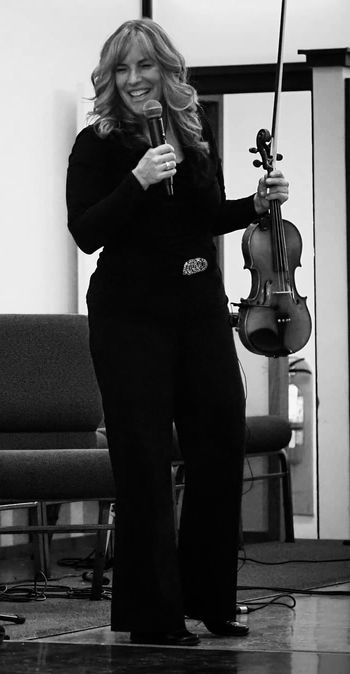 Performing as part of the Fiddles on the Rideau Trio
