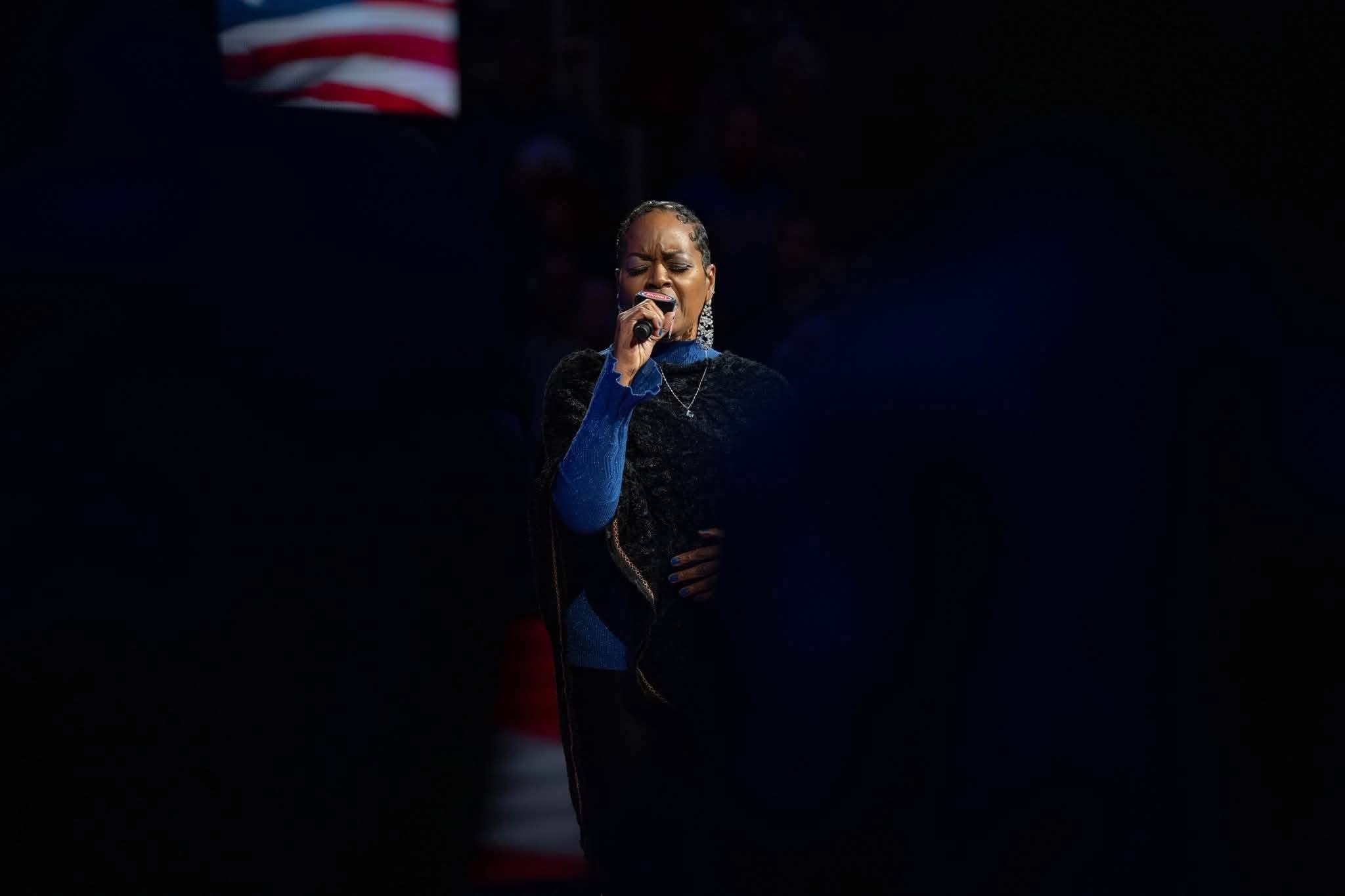 LaShell Renee singing at Little Caesars Arena.