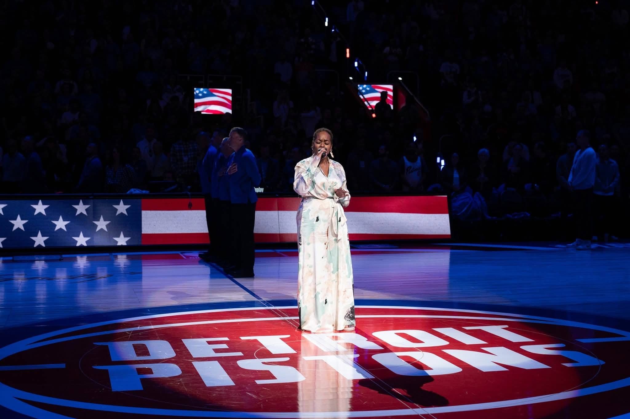 LaShell Renee performing the National Anthem for the Detroit Pistons at Little Caesars Arena.