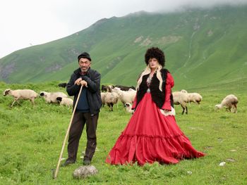 Kimberly Cofer promotional shot with Georgian shepherd in Gudauri, Georgia. Photo credit: Nini Mamulaidze
