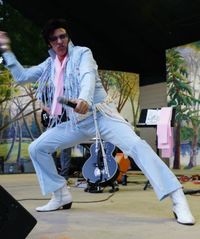 Anthony Liguori as Elvis