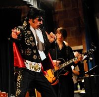 Anthony Liguori as Elvis