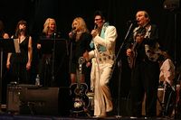 Anthony Liguori as Elvis