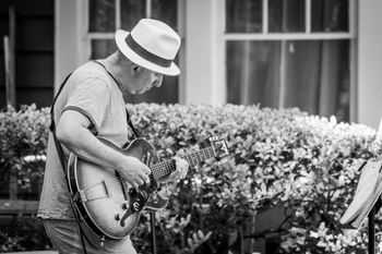 Lou at one of the 2020 pandemic-time front porch shows (photo by the great Stacy Beck)
