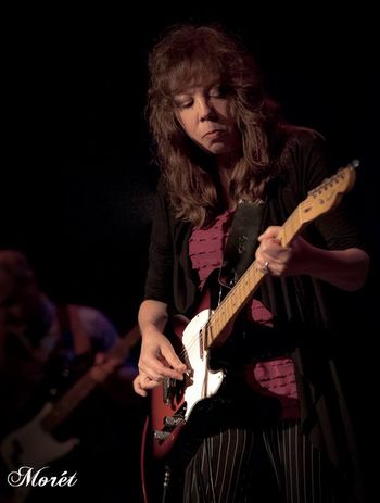 a serious moment, playing a sad song
