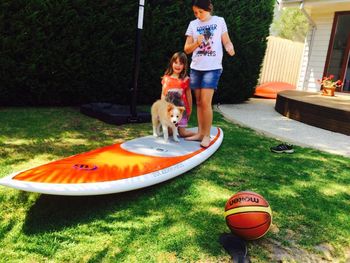 Rosie on and surf board
