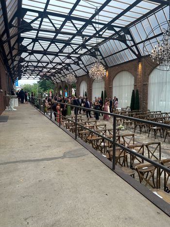 Wedding ceremony in the Sculpture Garden at Bridgeport Art Center, followed by cocktails and live strings.
