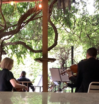 ceremony musicians at salvage one outdoor space