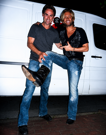 Mike Wolf, American Pickers, giving Brandon boots he picked
